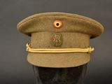a hat with a red eye on it on a mannequin head
