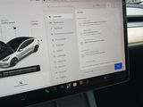 a computer screen with a car on it in a car