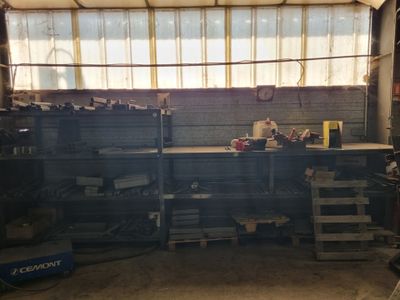 an image of a garage with a lot of tools