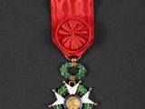 a close up of a medal on a black surface