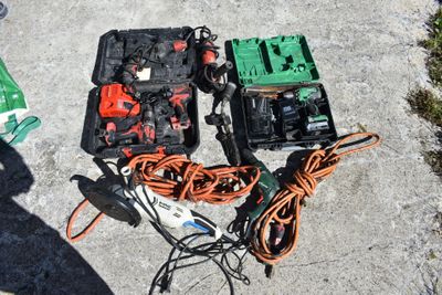 a lot of tools that are laying out on the ground