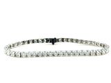 a diamond tennis bracelet on a white background
