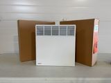 a white air conditioner sitting on a counter next to a brown box