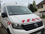 a van that is parked on the side of the road