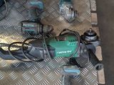 many tools that are sitting on the floor in the garage