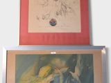 two paintings hanging on the wall next to each other