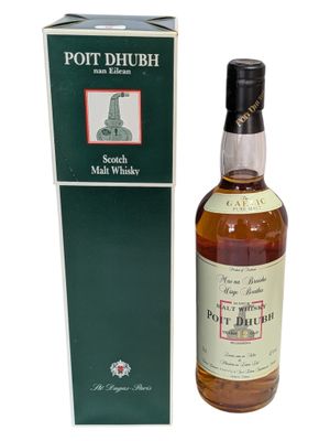a bottle of pott dhubh scotch whisky next to a box