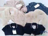 four jackets and two jackets with tags on them