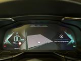 the dashboard of a car with a digital display on it