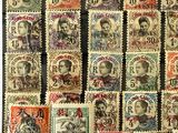 a close up of a bunch of stamps on a table