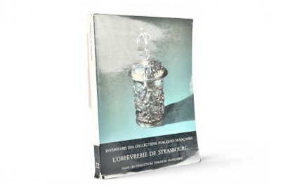 un livre sur la couverture duquel figure l'image d'un verre