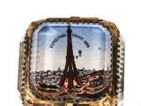 a picture of a glass box with a picture of the eiffel tower on it
