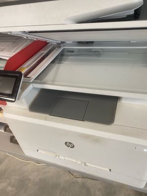 a printer that is sitting on top of a desk