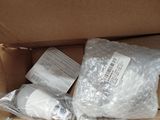 a cardboard box with a bunch of items inside of it