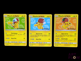 three pokemon cards are shown in a row on a black background