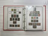 a lot of stamps on the pages of a book
