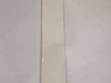 a white tie that is laying on a white sheet