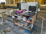 an image of a work station with a computer on top of it