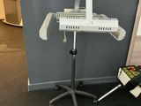 a computer desk with a keyboard on top of it