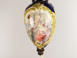 a lamp that has a picture of a woman on it