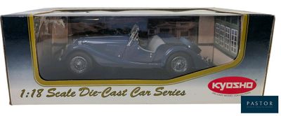 model of a blue car in a box on a white background