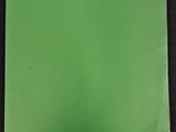 the book is green and has gold lettering on it