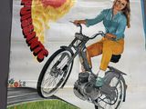 a poster of a woman riding a motorcycle on the street