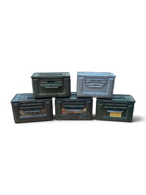 several boxes are stacked on top of each other on a white surface
