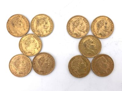 six different types of gold coins on a white surface