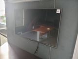 a flat screen tv mounted on a wall in a room