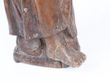 a statue of a man with a hat and a cane