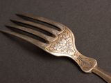 a fork that is sitting on a table