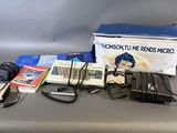 a bag of electronic equipment sitting on a table