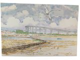 two seagulls flying over a body of water with a bridge in the background