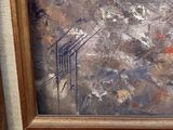 une image d'un tableau dans un cadre sur le mur
