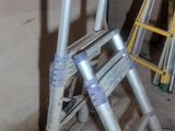 a ladder leaning against a wall in a room