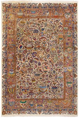 an antique persian rug with a floral design on a beige ground