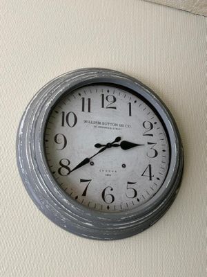 a clock that is on the wall of a room