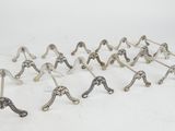 un lot de douze poignées de porte anciennes en métal argenté