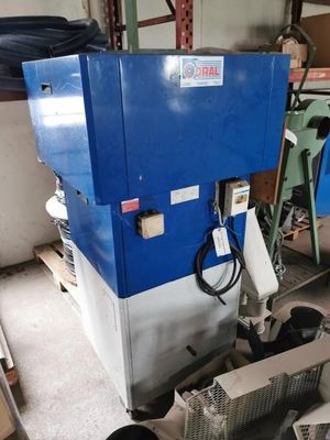 a blue machine that is sitting in a room