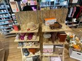 many items on the shelves in the store for sale