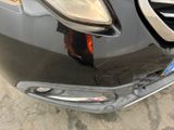 a close up of the front bumper of a car