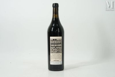 a bottle of wine that is sitting on a table