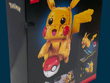 a box with a lego pikachu figure inside of it
