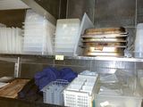 many dishes on the shelves in the kitchen
