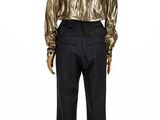 the mannequin is wearing a gold shirt and black pants