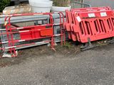 a pile of red and silver items sitting on the side of the road