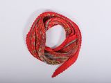 an image of a red scarf on a white surface