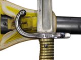 a close up of a sword with a hook on it