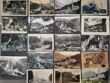 several old black and white photos of a bunch of buildings